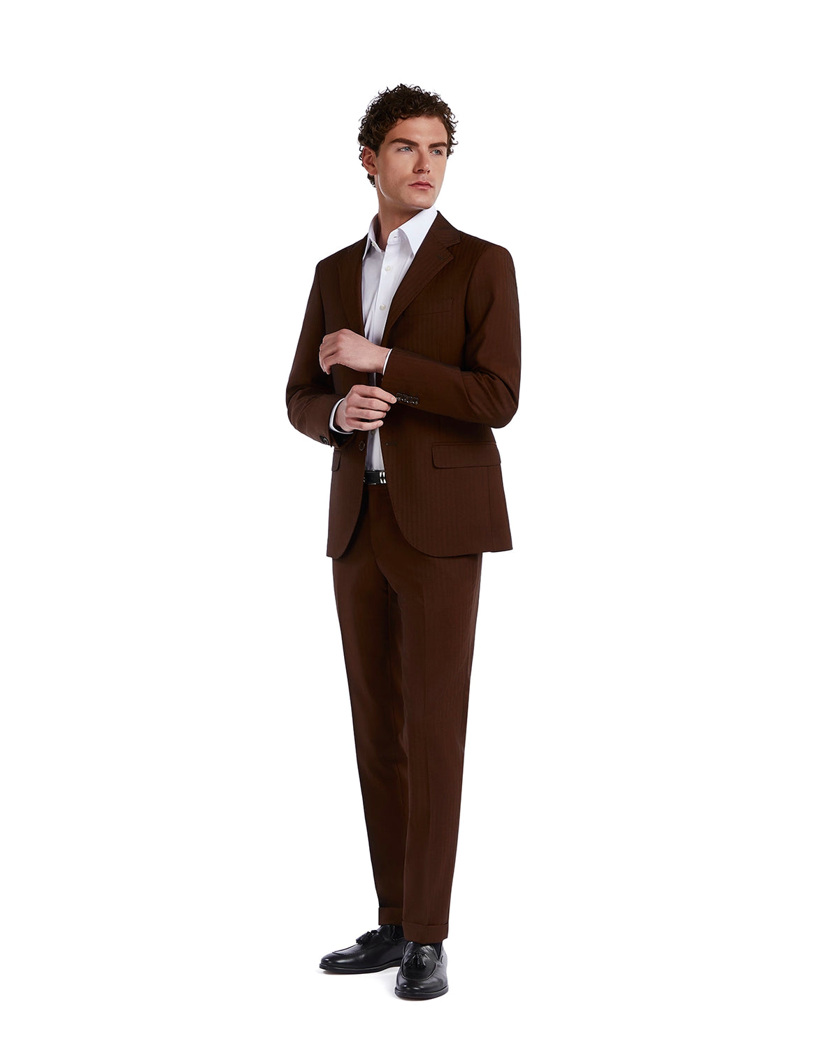 Brown slim-fit suit with subtle stripes, paired with a white dress shirt and black shoes, perfect for formal occasions.