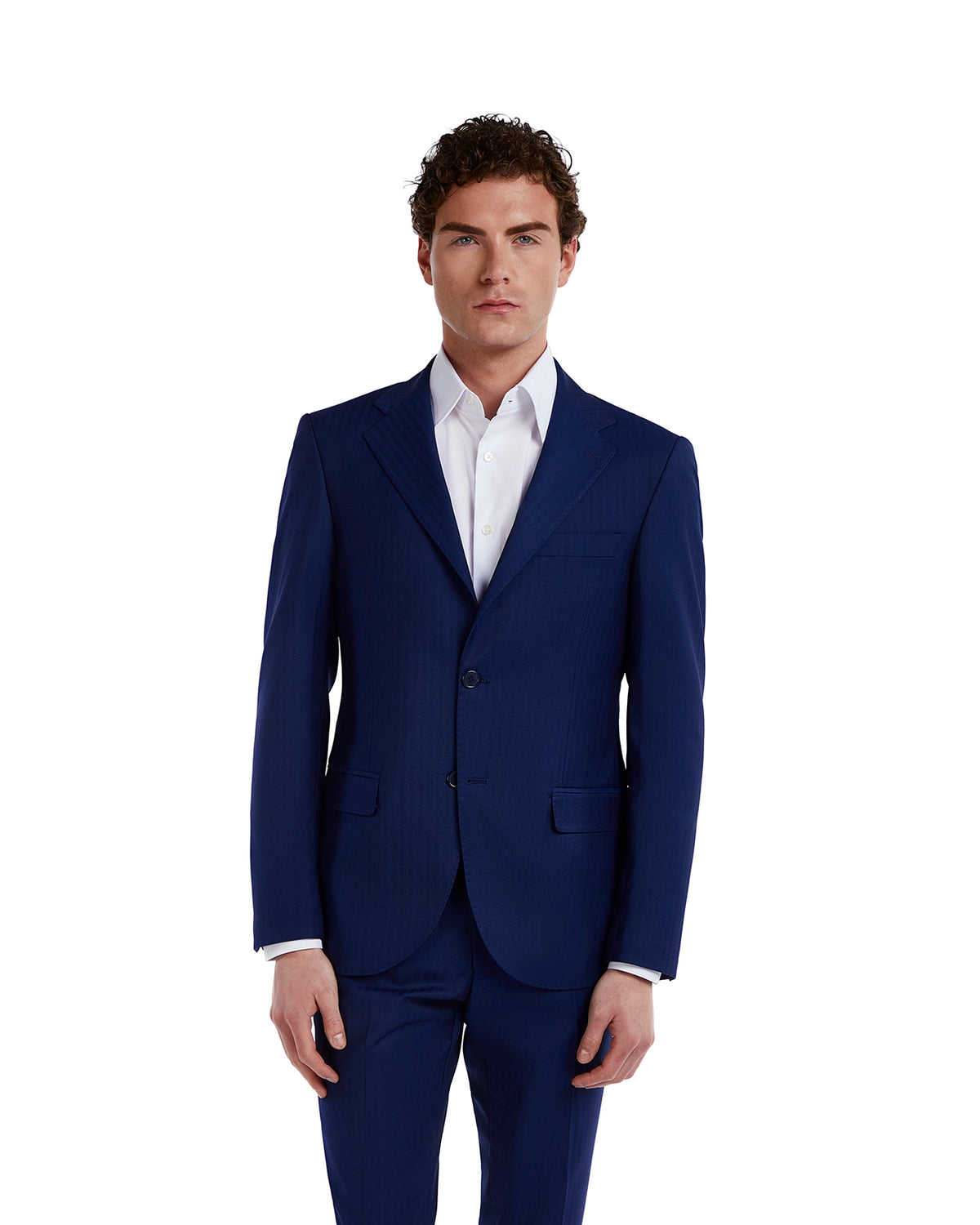 Men's navy blue suit made of lightweight fabric, featuring a slim fit and notch lapels, paired with a white dress shirt.
