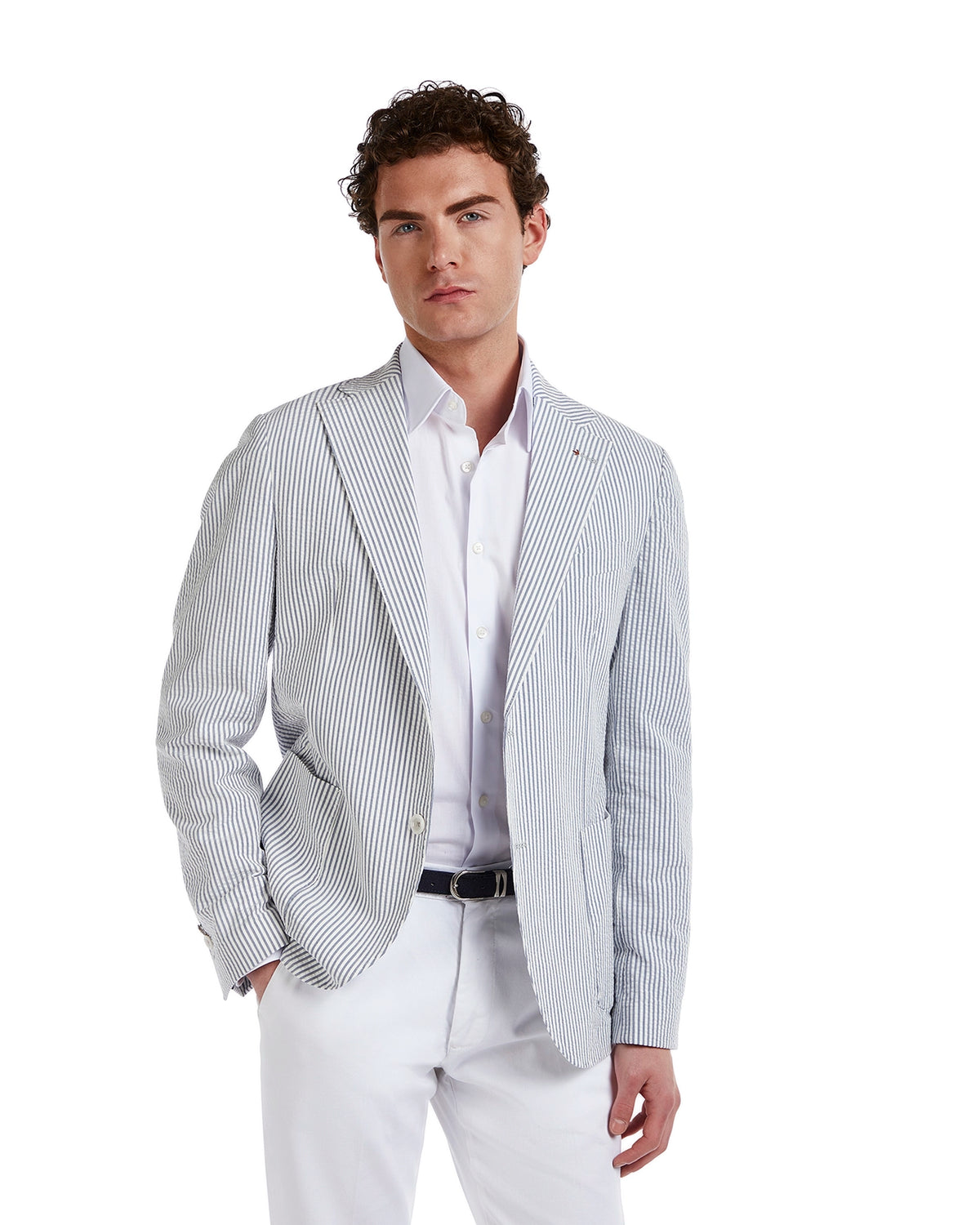 Men's blue and white striped blazer, lightweight cotton, tailored fit, styled with a white shirt and navy belt.
