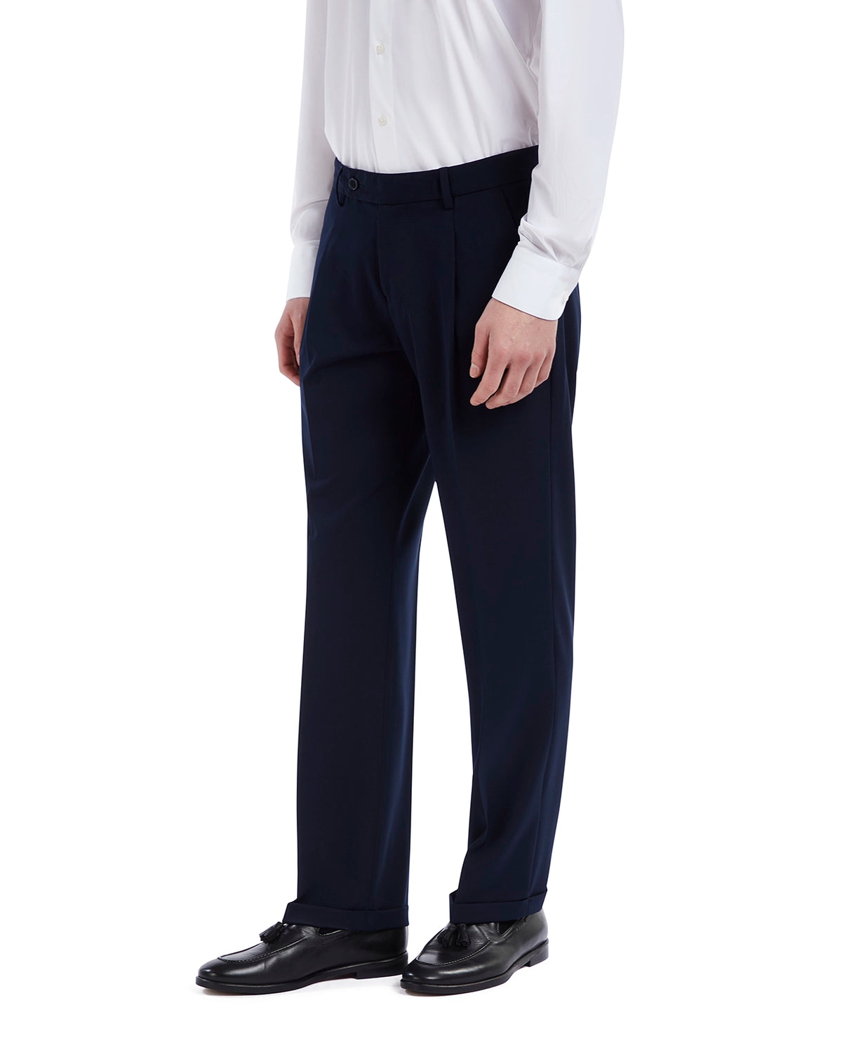 Men's navy dress pants in lightweight fabric, tailored fit, styled with a crisp white shirt and black shoes.