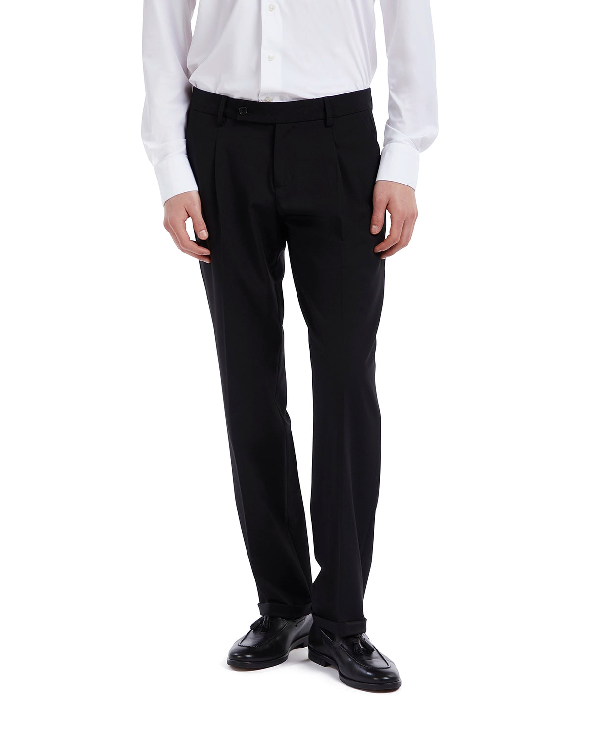 Men's black dress pants in tailored fit, made of high-quality fabric, paired with a white dress shirt and formal shoes.