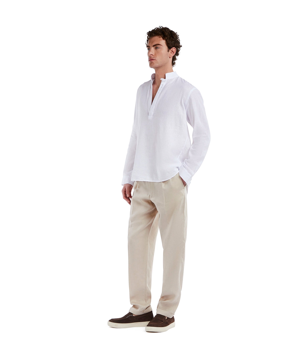 White linen casual shirt with a relaxed collar, paired with beige trousers and brown loafers. Perfect for summer outings.