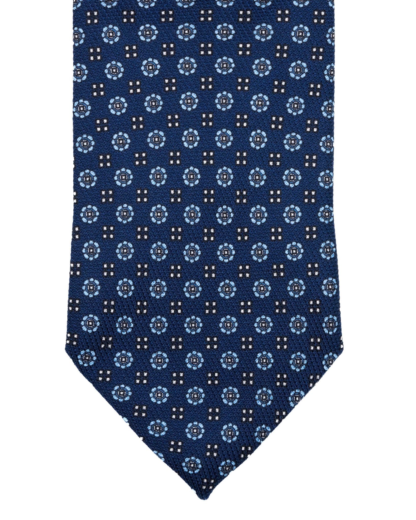 Tie - in blue silk with relief designs