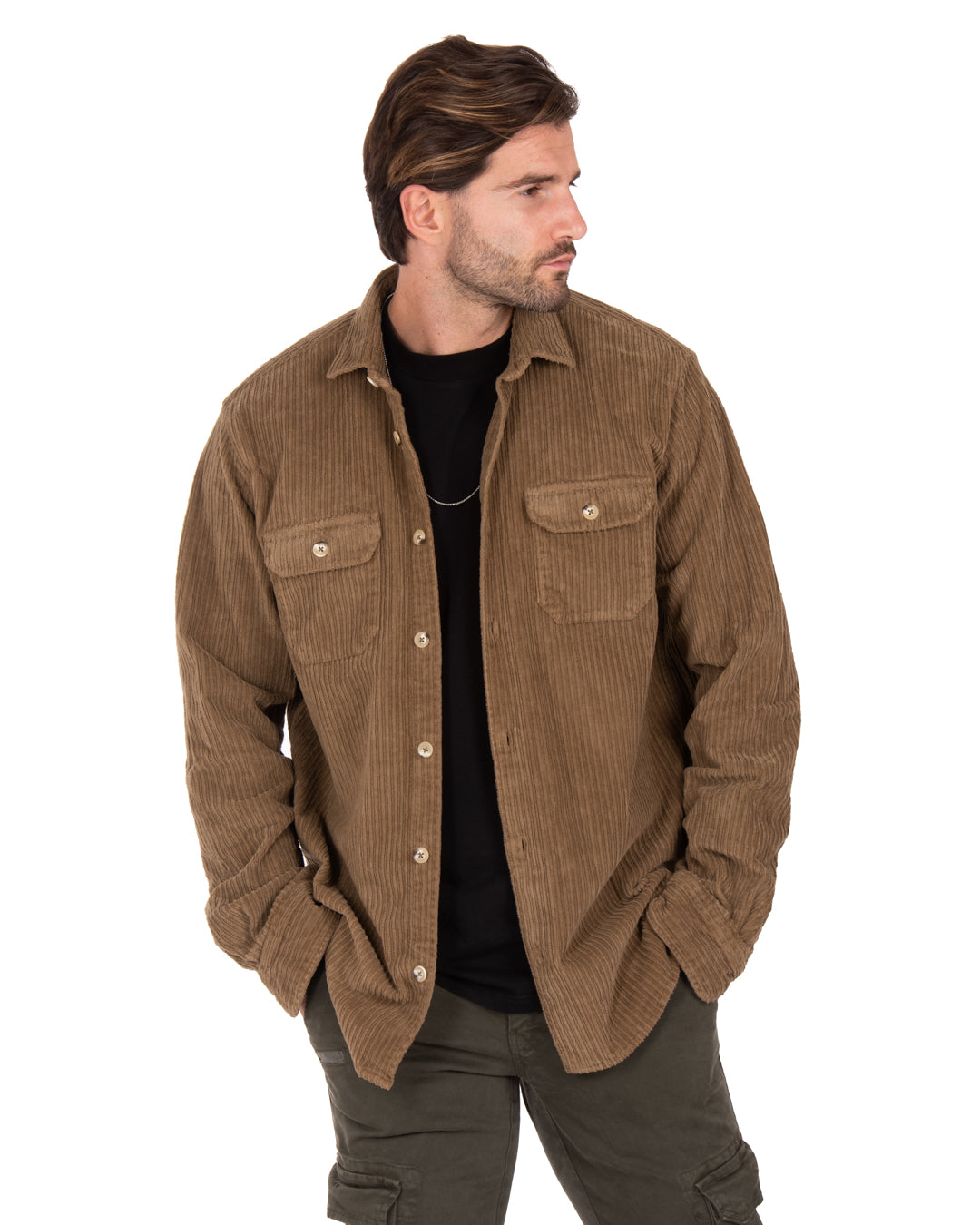 Brown corduroy shirt jacket with two front pockets, styled for a casual, layered look. Perfect for cool weather.
